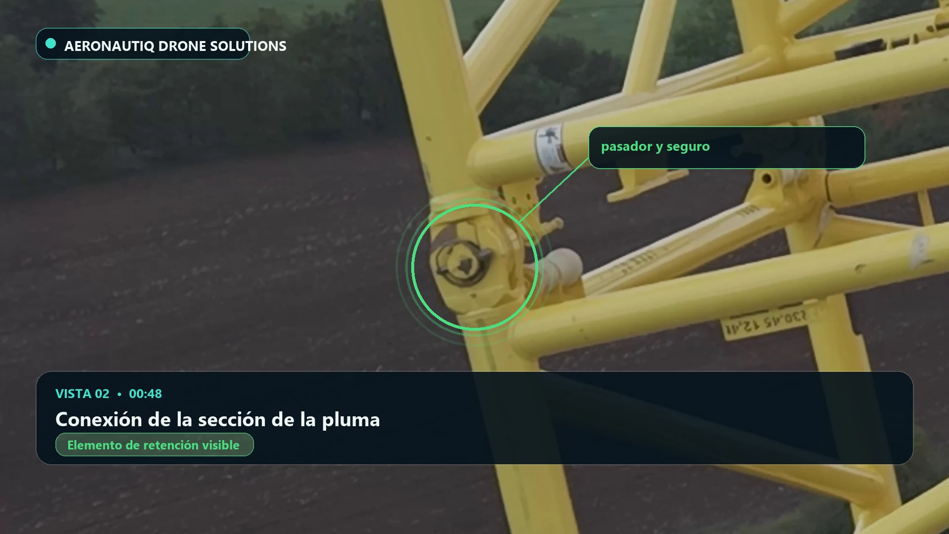 Conexión de la sección de la pluma. Extremo del pasador destacado en 00:48.